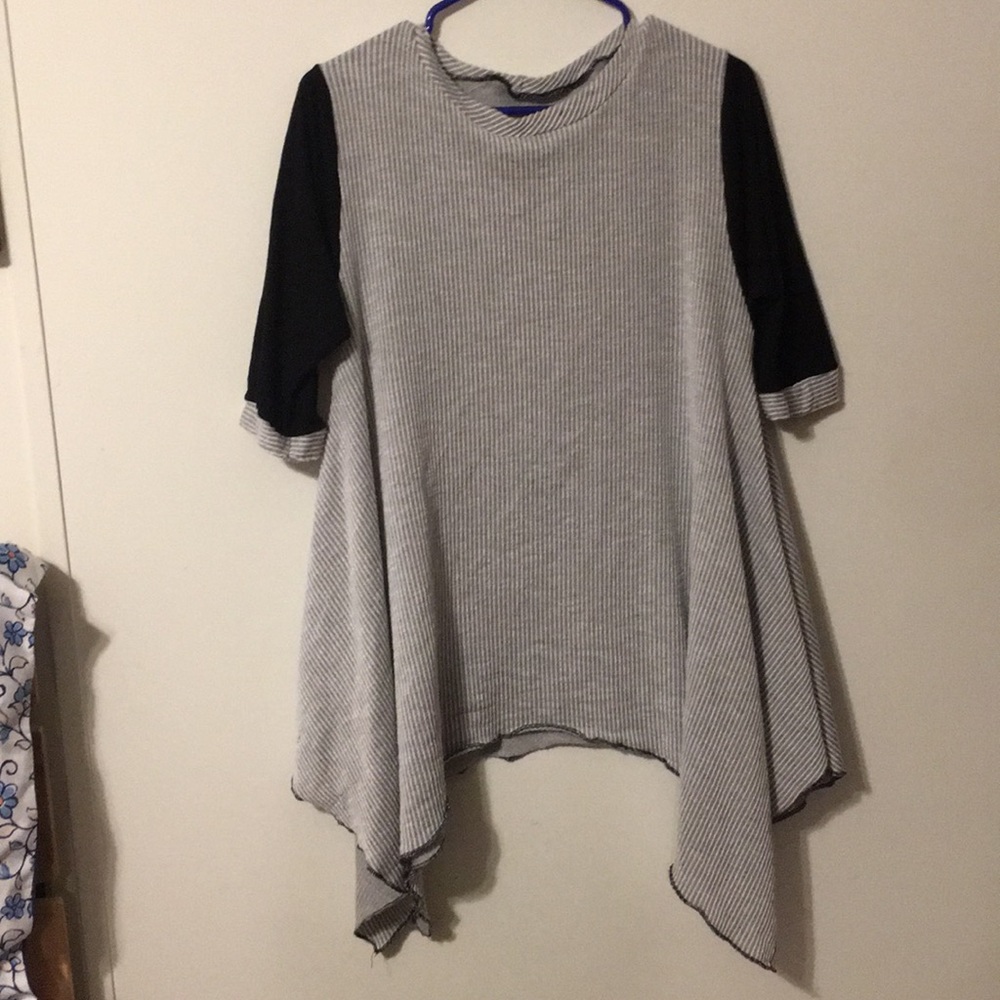 Gray and white striped shirt with black sleeves